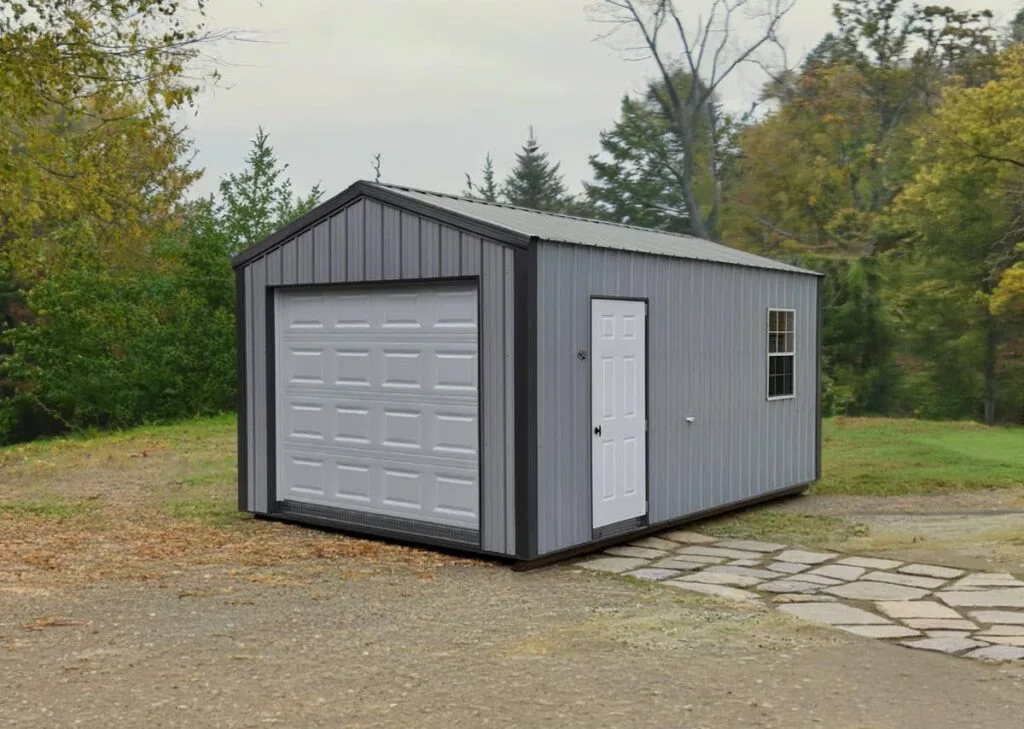 Gray Classic Garage with black trim, overhead garage door, side entry door, and side window on a rural lot