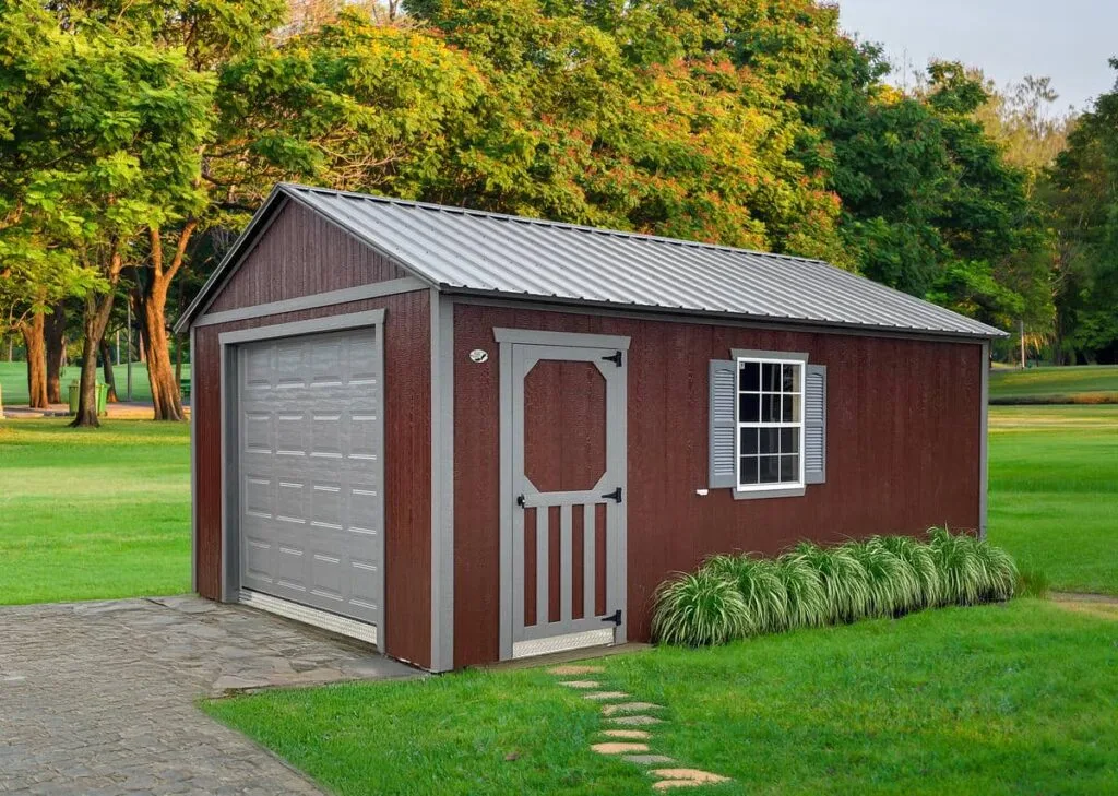 Brown Elite Garage with gray trim, overhead garage door, side entry door, and window beside a lawn