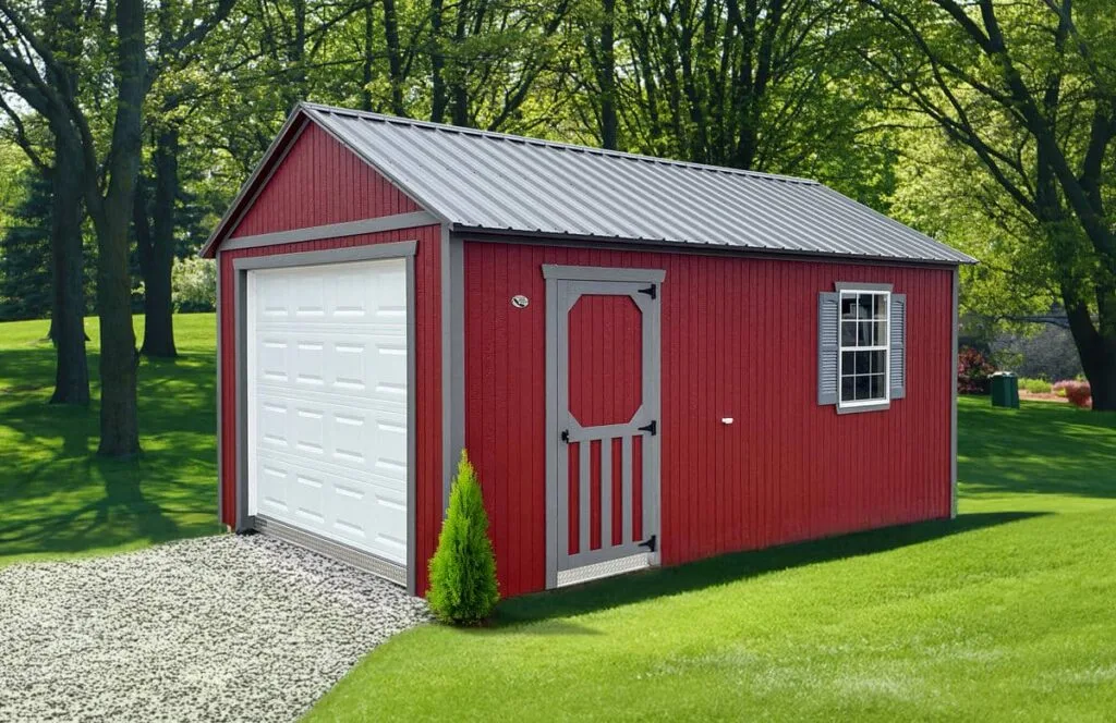 Red Elite Garage with gray trim, overhead garage door, side entry door, and window in a park-like setting