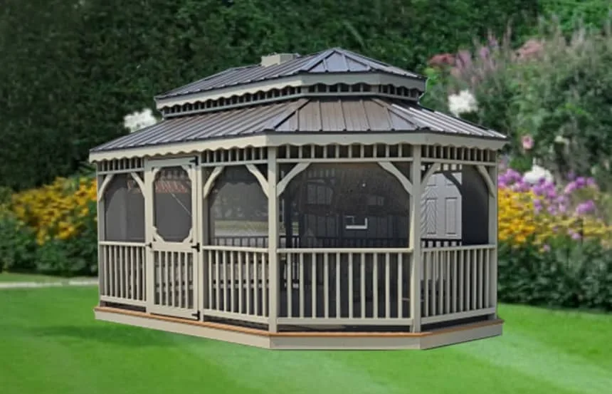 Beige screened gazebo with octagon shape, metal roof, and entry door in a garden setting